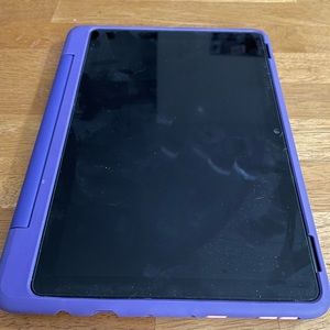 Amazon Fire Tablet with purple case and 128GB memory card